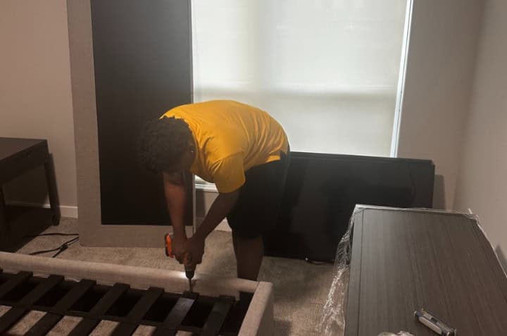 Pantheon Moving crew completing a delivery and assembly job in Kansas City