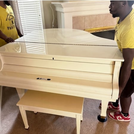 Pantheon Moving crew carefully moving furniture in a Kansas City home