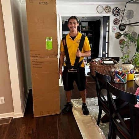 Pantheon Moving crew member handling belongings during a Kansas City move
